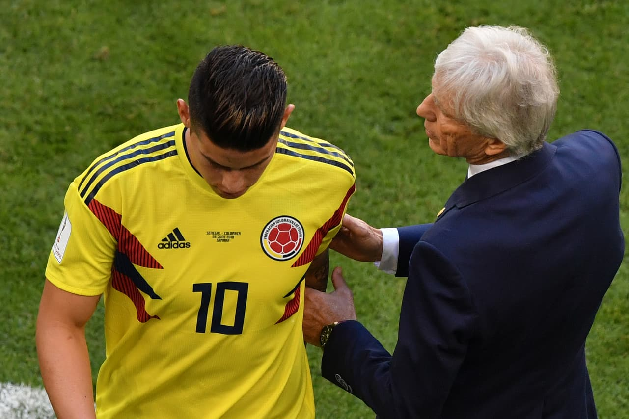 Colombia's midfielder James Rodriguez leaves the football pitch due to an injury as he is conforted by Colombia's coach Jose Pekerman (R) during the Russia 2018 World Cup Group H football match between Senegal and Colombia at the Samara Arena in Samara on June 28, 2018. (Photo by Fabrice COFFRINI / AFP) / RESTRICTED TO EDITORIAL USE - NO MOBILE PUSH ALERTS/S (Photo credit should read FABRICE COFFRINI/AFP/Getty Images)